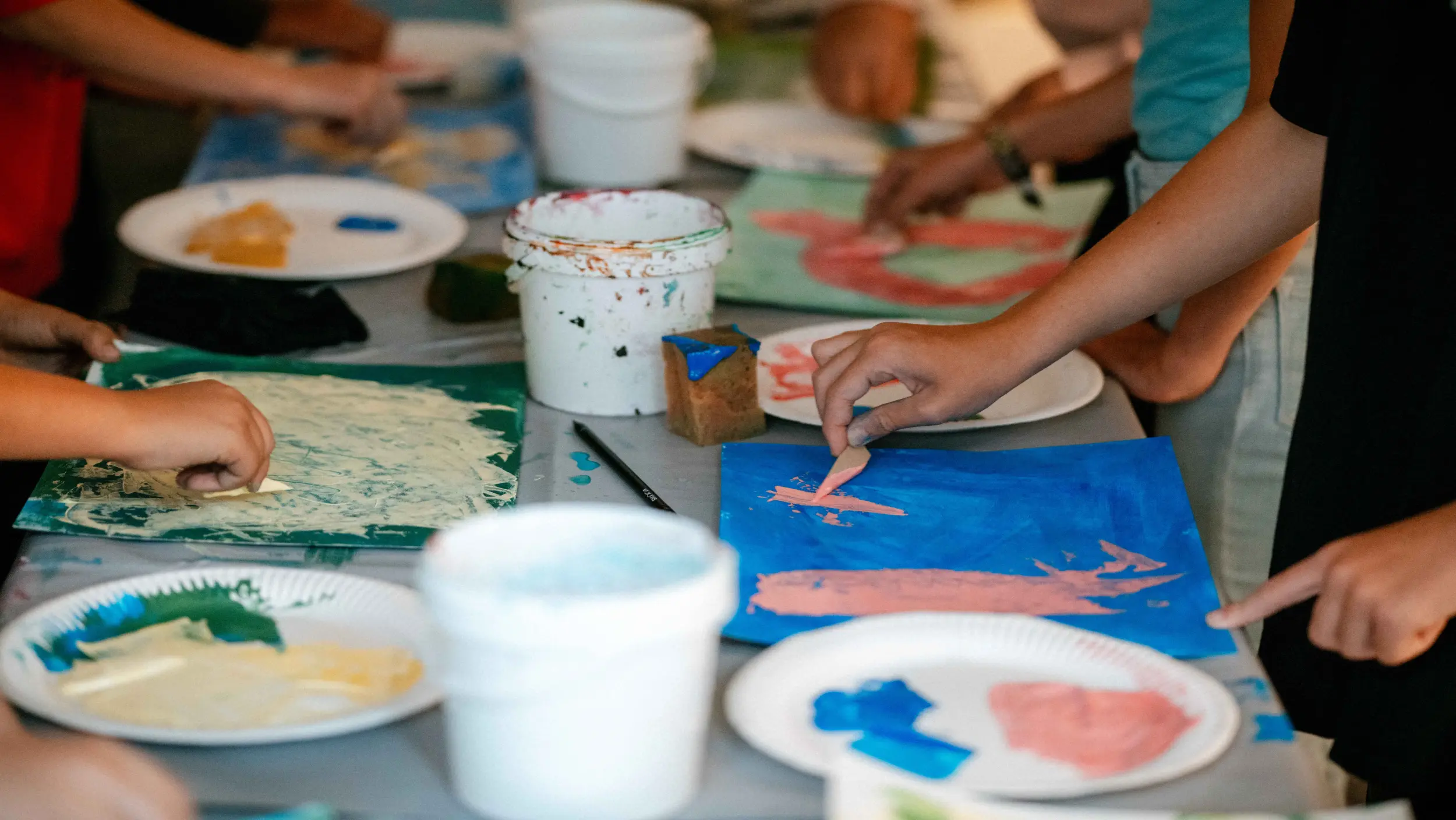 Pupils experimenting creatively with colors